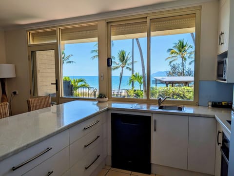 Pet Friendly - Two Bedroom Beachfront Apartment with Yard | Living area | 32-inch LCD TV with digital channels, TV, DVD player