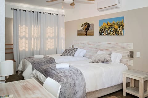 Hypo-allergenic bedding available, down comforters, in-room safe, desk