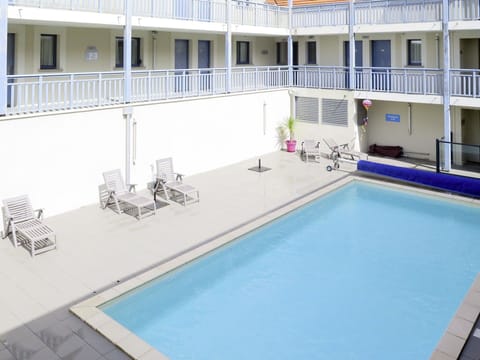 Water, Property, Window, Swimming Pool, Building, Chair, Floor, Flooring, Leisure, Condominium