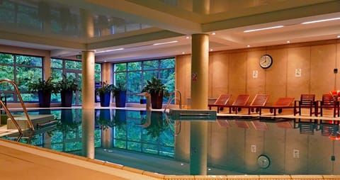 Indoor pool, open 8:00 AM to 9:00 PM, lifeguards on site