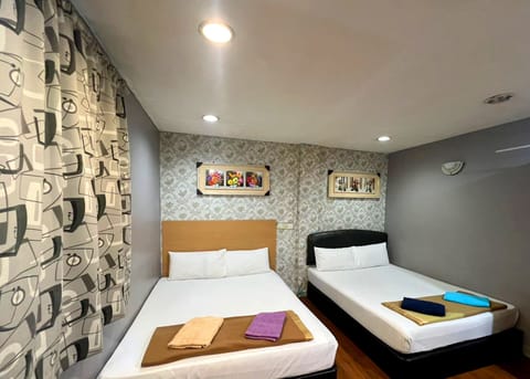 Quadruple Room, 2 Queen Beds | Desk, iron/ironing board, free WiFi, bed sheets