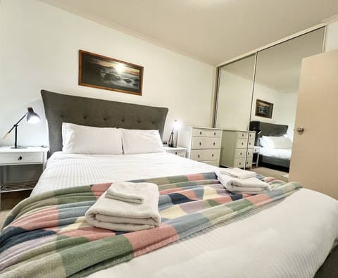 Luxury upholstered bed with comfortable Koala brand latex mattress. Made for Australian conditions. Bed & bath linen hire included. Designs will vary.
