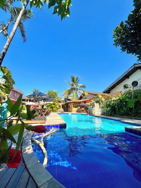 Outdoor pool, open 10:00 AM to 8:00 PM, pool umbrellas, sun loungers
