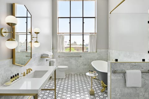 Shower, rainfall showerhead, designer toiletries, hair dryer