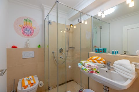 Deluxe Double Room, Balcony | Bathroom | Shower, hair dryer, towels, soap