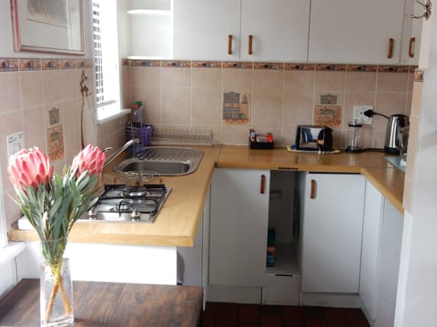 Comfort Cottage, 2 Bedrooms | Private kitchen | Stovetop, electric kettle, cookware/dishes/utensils