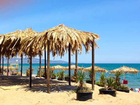 Private beach, sun loungers, beach umbrellas, beach volleyball
