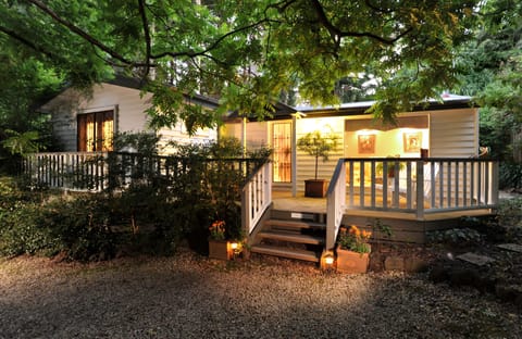 Deluxe Cottage, 2 Queen Beds, Garden View | Front of property - evening/night