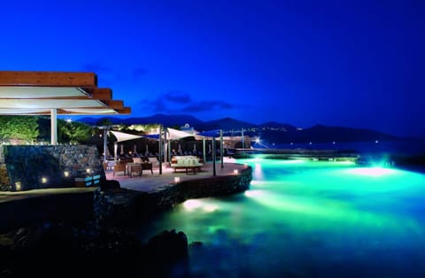 3 bars/lounges, poolside bar, beach bar