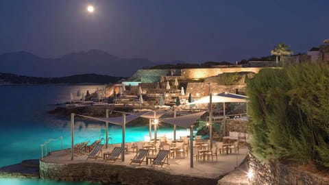 3 bars/lounges, poolside bar, beach bar