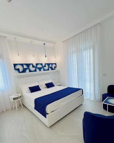 Deluxe Room | Premium bedding, minibar, in-room safe, individually decorated