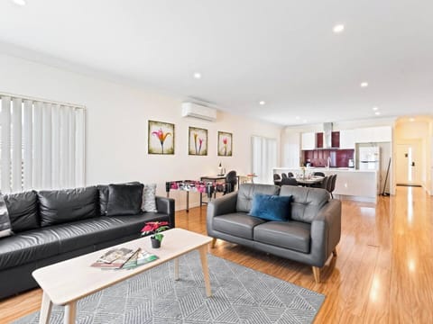 Spacious open plan kitchen, dining, living area.