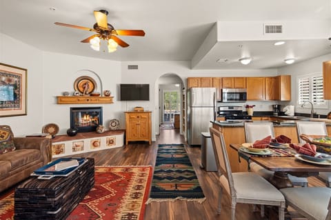 The dining area opens onto a private outdoor patio