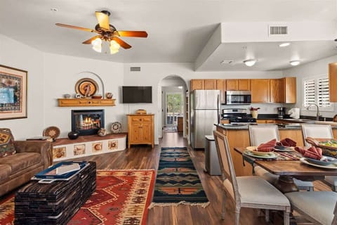 The dining area opens onto a private outdoor patio