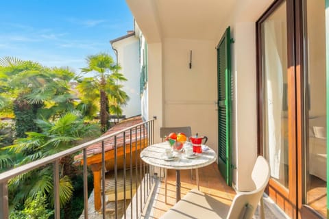 Family Apartment, 1 Bedroom, Balcony (Casa Chiara Muralto) | Outdoor dining