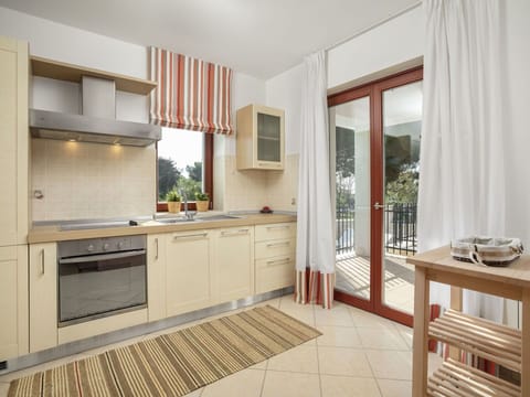 Furniture, Property, Room, Cabinetry, Interior Design, Building, Countertop, Kitchen, Floor, Real Estate