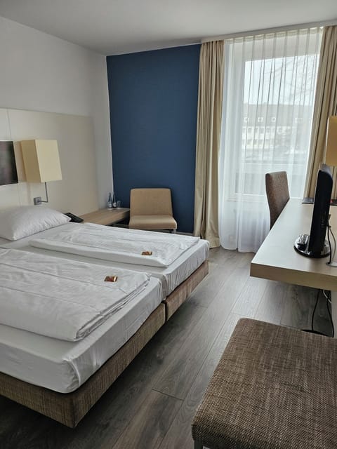 Comfort Twin Room | Hypo-allergenic bedding, iron/ironing board, free WiFi, bed sheets