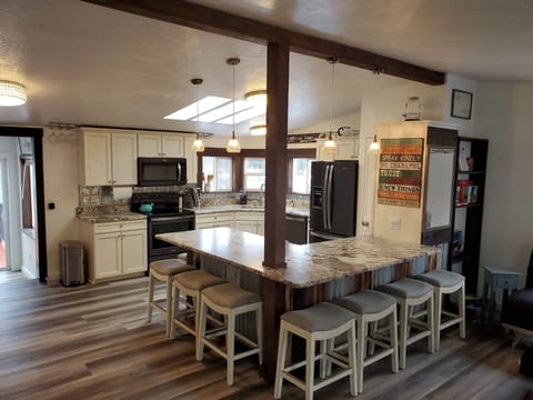 Kitchen with Bar/Seating Area. Board Games to Right

