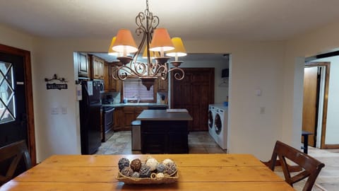 From the dining room you can view the kitchen.