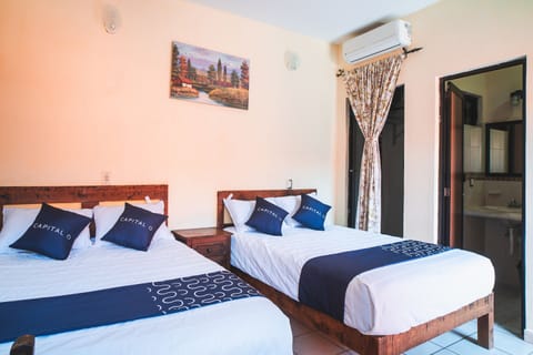Standard Room, 2 Double Beds | WiFi (free), bed sheets