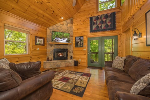 Enjoy a cozy evening in front the gas fireplace watching the 55” Smart TV