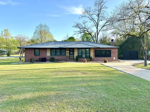 Large ranch style house with 2 newly renovated bath rooms and a huge back yard.
