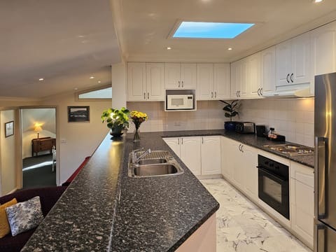 Apartment | Private kitchen | Fridge, coffee/tea maker, electric kettle