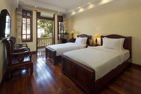 Junior Suite, Balcony, City View | Memory foam beds, minibar, in-room safe, desk