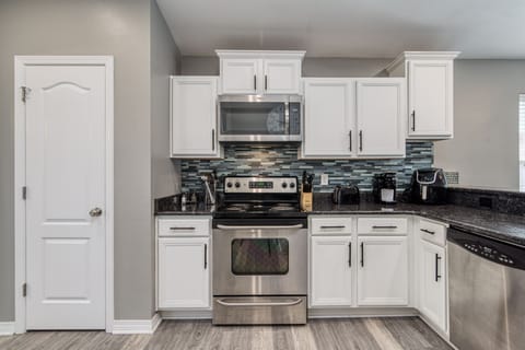 Kuerig coffee maker and air fryer, huge pantry on the left