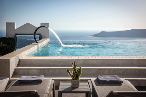 Seasonal outdoor pool, open 8:00 AM to 6:30 PM, pool umbrellas