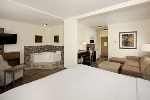 Suite, 1 King Bed, Jetted Tub | Pillowtop beds, desk, laptop workspace, blackout drapes