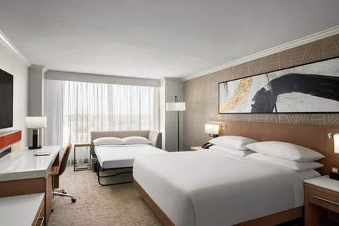 Premium bedding, down comforters, pillowtop beds, in-room safe