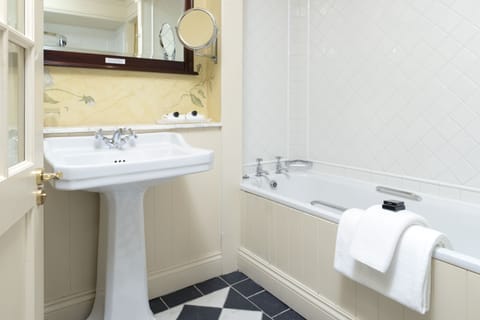 Combined shower/tub, eco-friendly toiletries, hair dryer, towels