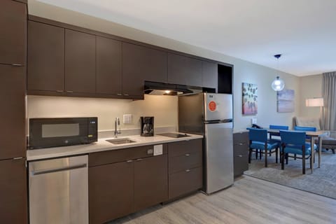 Desk, laptop workspace, blackout drapes, iron/ironing board