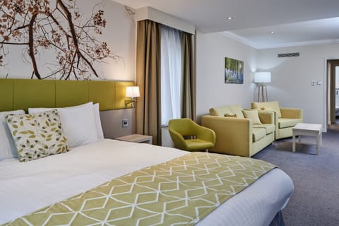 Suite, 1 King Bed | In-room safe, desk, laptop workspace, soundproofing