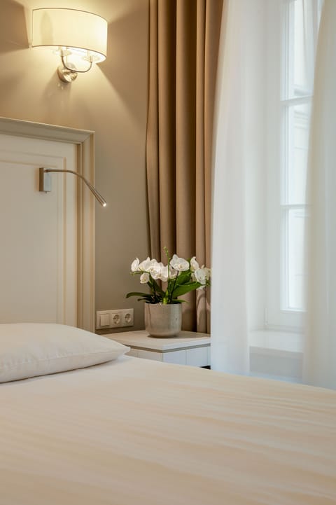 Hypo-allergenic bedding, minibar, in-room safe, individually decorated