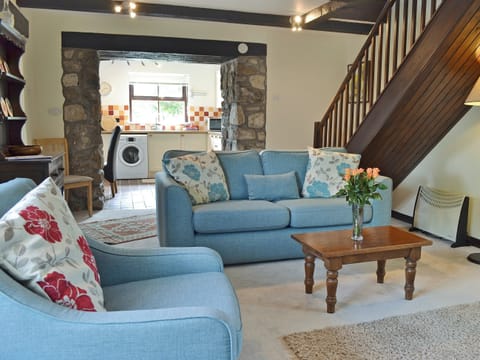 Tastefully furnished living area with wood burner | Barncott - Trewellard Manor Farm, Trewellard, near Penzance