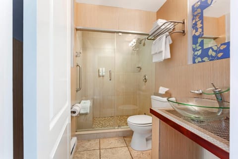 Desk, iron/ironing board, bed sheets, alarm clocks