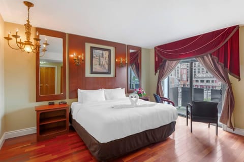 Desk, iron/ironing board, bed sheets, alarm clocks