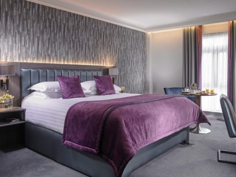 Hypo-allergenic bedding, desk, blackout drapes, soundproofing