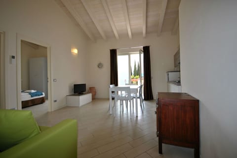 Standard Apartment, Lake View | Living room | 22-inch flat-screen TV with satellite channels, TV