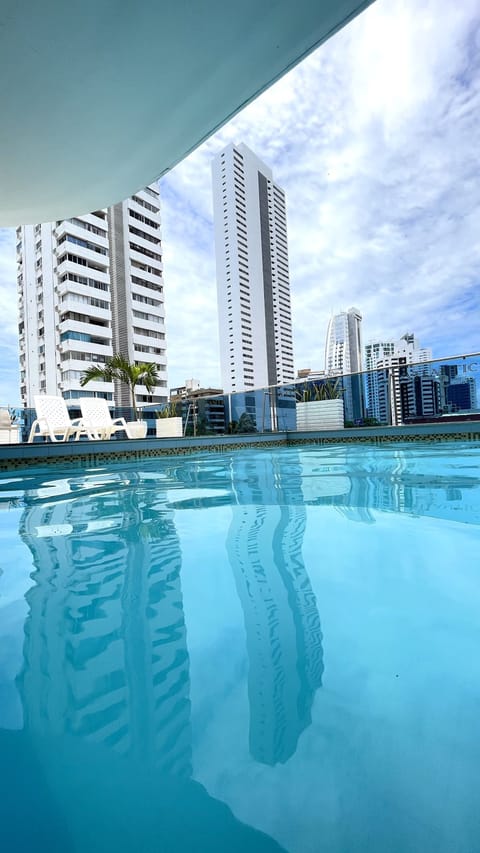 Outdoor pool, open 9:00 AM to 6:00 PM, sun loungers