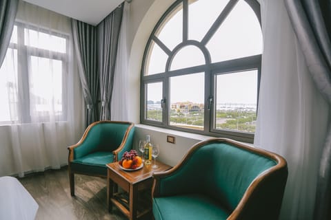 Executive Suite, Sea View | Premium bedding, down comforters, pillowtop beds, minibar