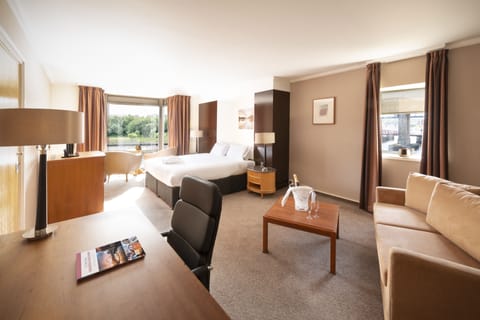 Executive Suite | In-room safe, desk, laptop workspace, iron/ironing board