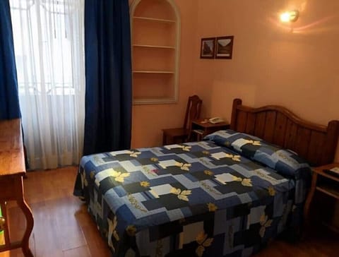Economy Double Room, 1 Double Bed | Pillowtop beds, in-room safe, free WiFi, bed sheets