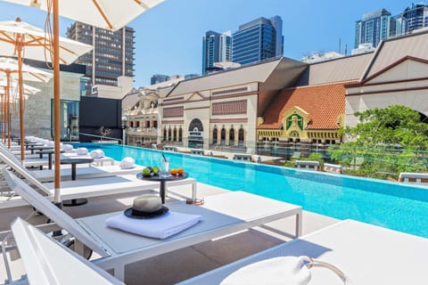 Outdoor pool, open 6:00 AM to 8:00 PM, pool umbrellas, sun loungers
