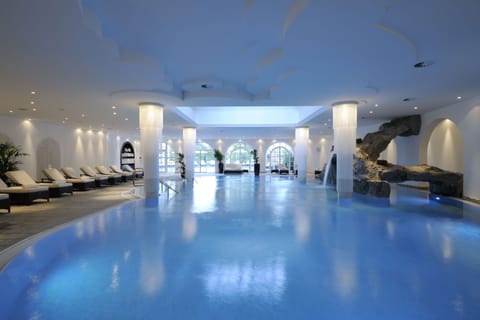 Indoor pool, outdoor pool, open 6 AM to 10 PM, pool umbrellas