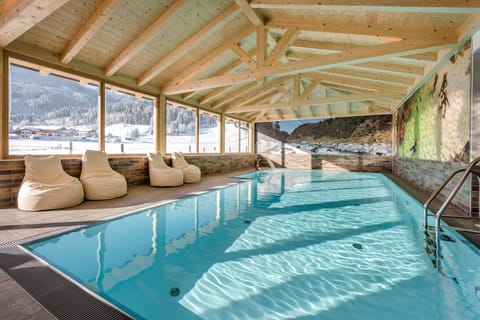 Indoor pool, seasonal outdoor pool, pool umbrellas, sun loungers