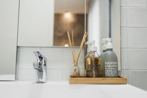 Rainfall showerhead, hair dryer, slippers, towels