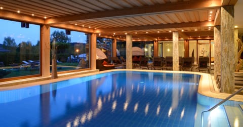 Indoor pool, outdoor pool, pool umbrellas, sun loungers